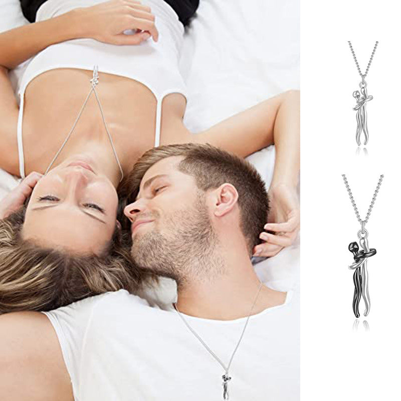 Couple hugging necklace