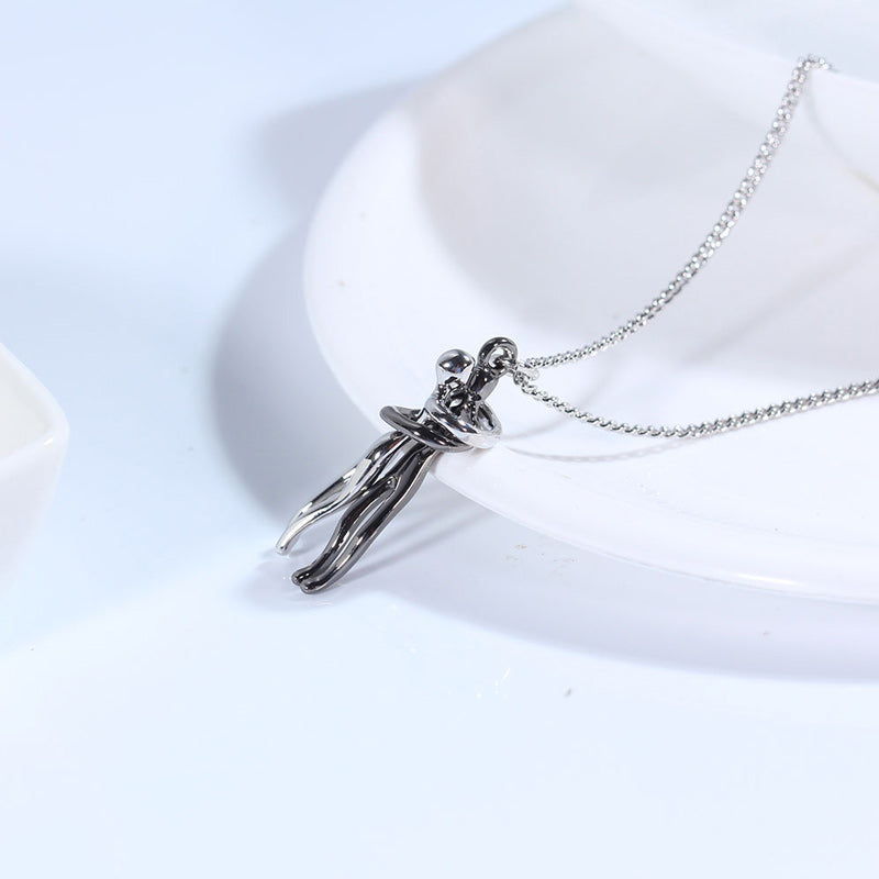 Couple hugging necklace