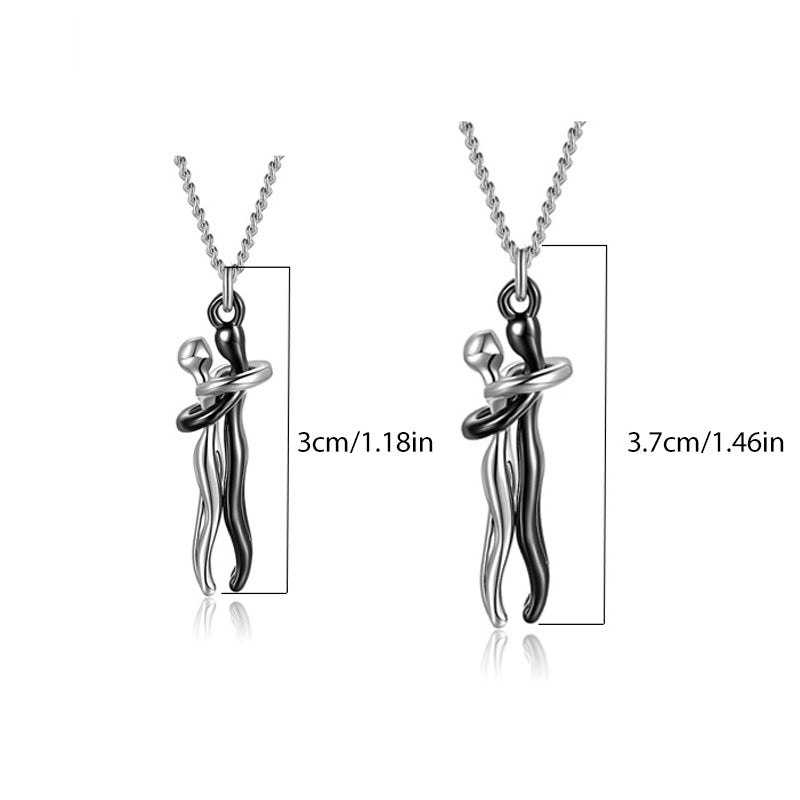 Couple hugging necklace