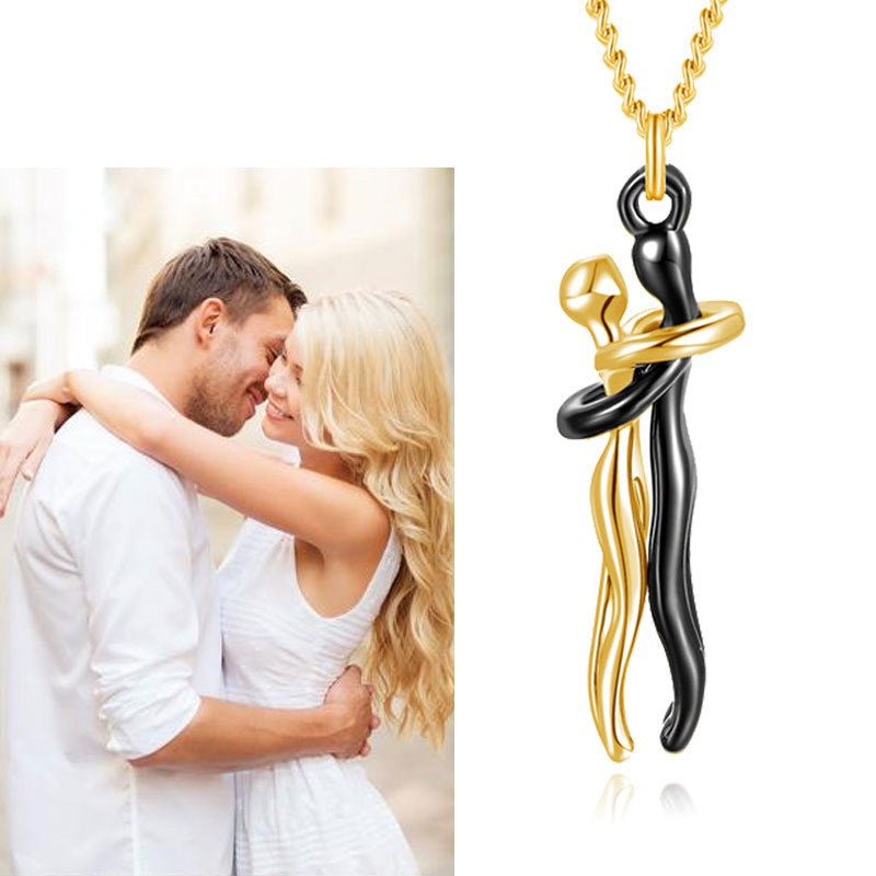 Couple hugging necklace